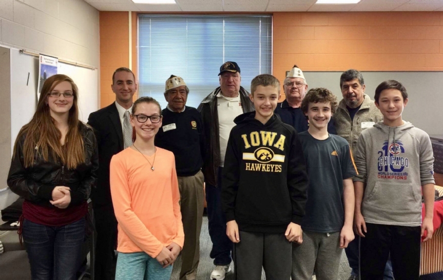 Members of VFW Post 8879 meeting with 7th grade students from Stilwell Jr. High School discussing military experiences, and our member’s role in the VFW.